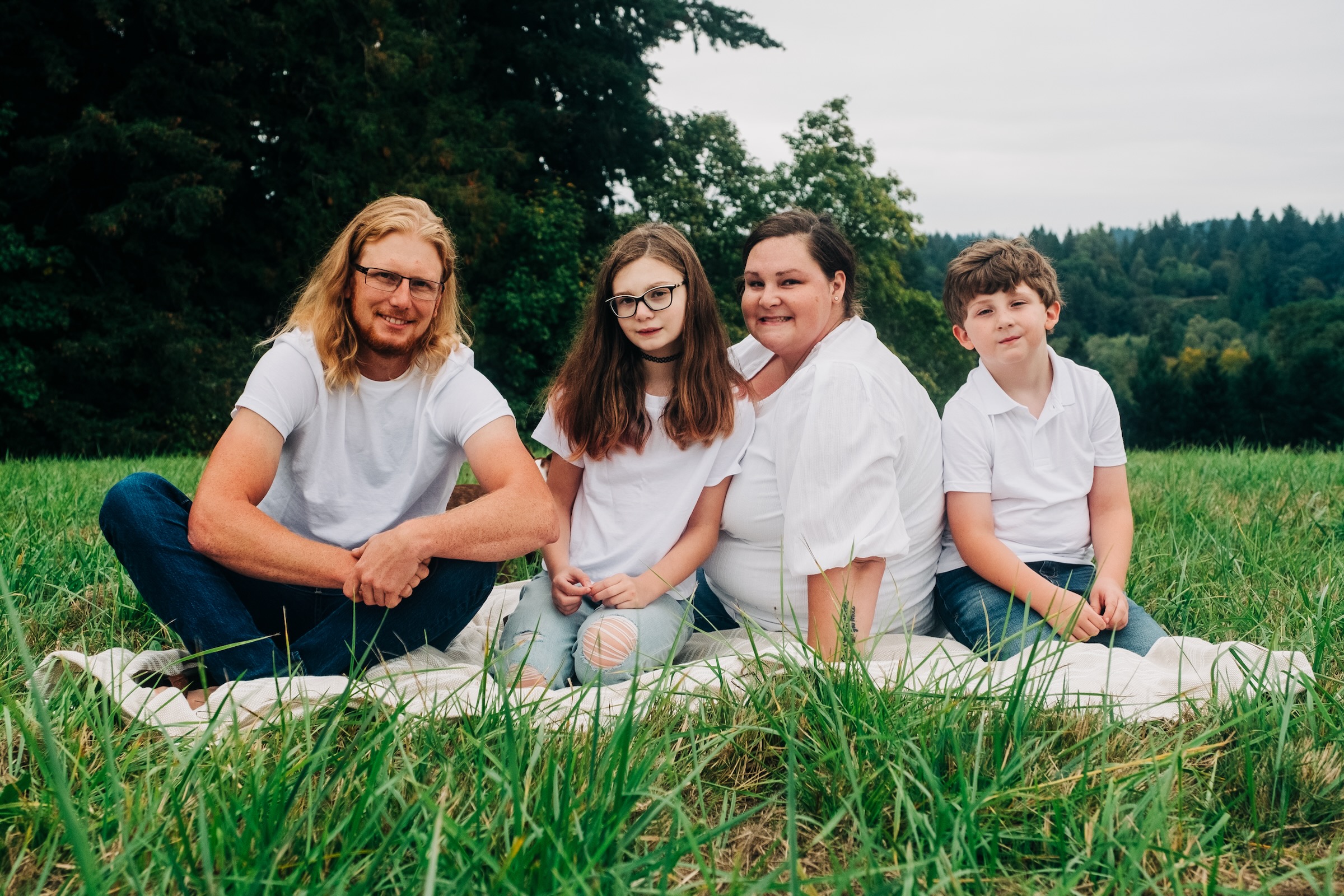 Family enjoying quiet time together in a scenic Pacific Northwest landscape